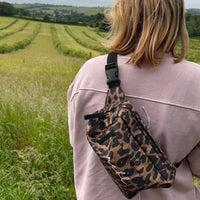 Load image into Gallery viewer, REBL Leopard Crossbody Bag with Elderberry Embroidered Logo
