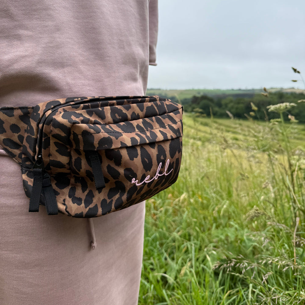 REBL Leopard Crossbody Bag with Elderberry Embroidered Logo
